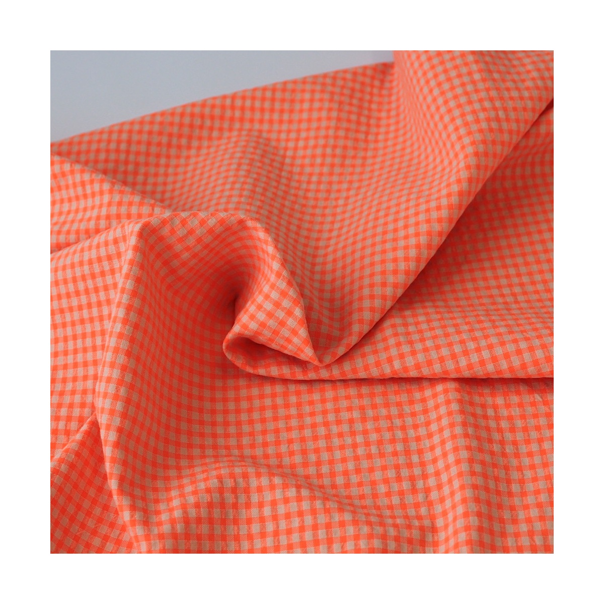 Seersucker / Coton gaufré vichy orange fluo