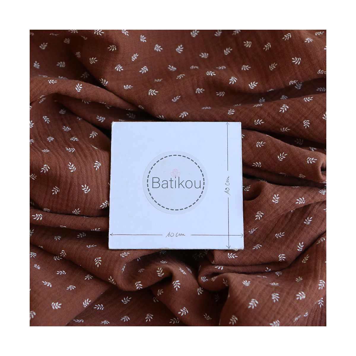 Sacha - Double gaze de coton motif feuilles fond noisette