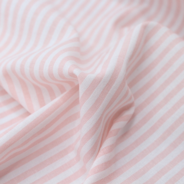 Tissu Coton gaufré à rayures coloris rose nude