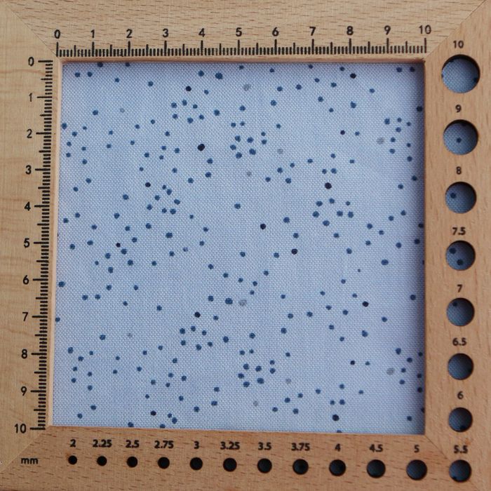 Chambray coton bleu clair nuée de pois marine