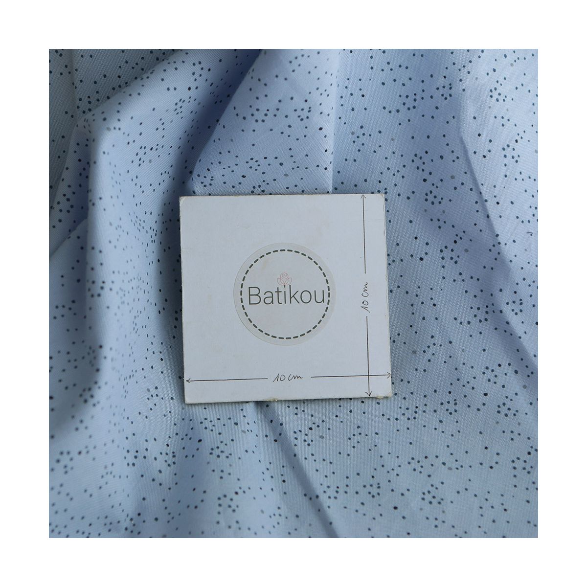 Chambray coton bleu clair nuée de pois marine