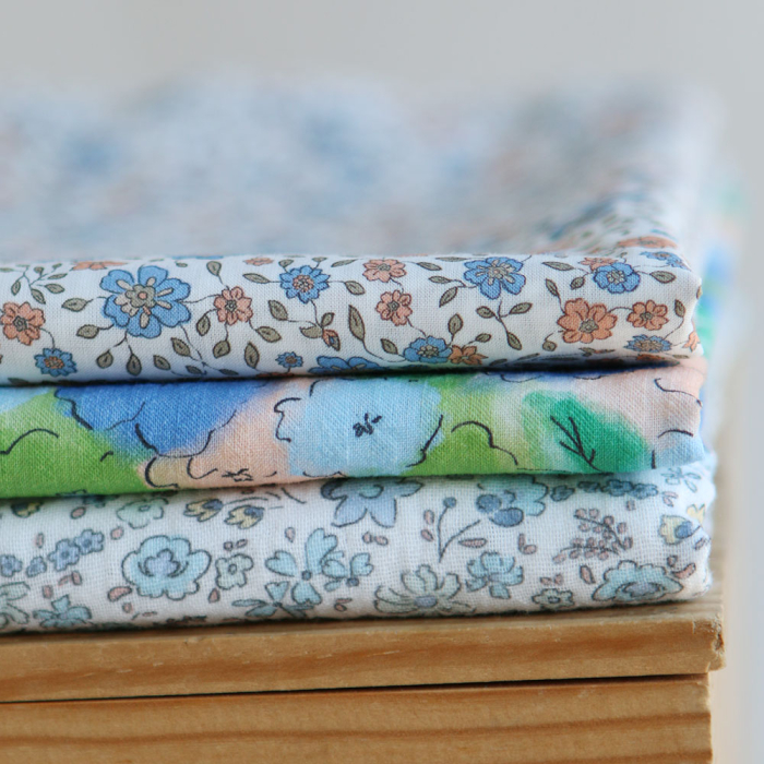 Albane - Double gaze de coton motif fleuri bleu ciel