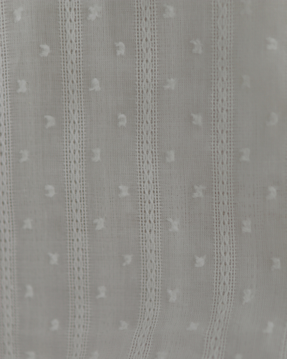 Broderie anglaise plumetis coton coloris blanc cassé