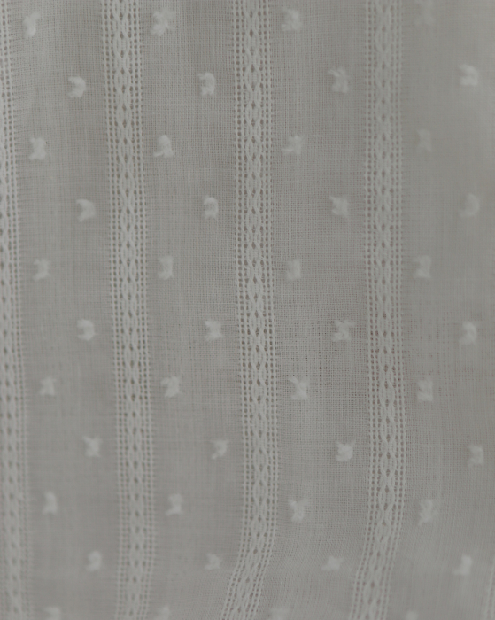 Broderie anglaise plumetis coton coloris blanc cassé