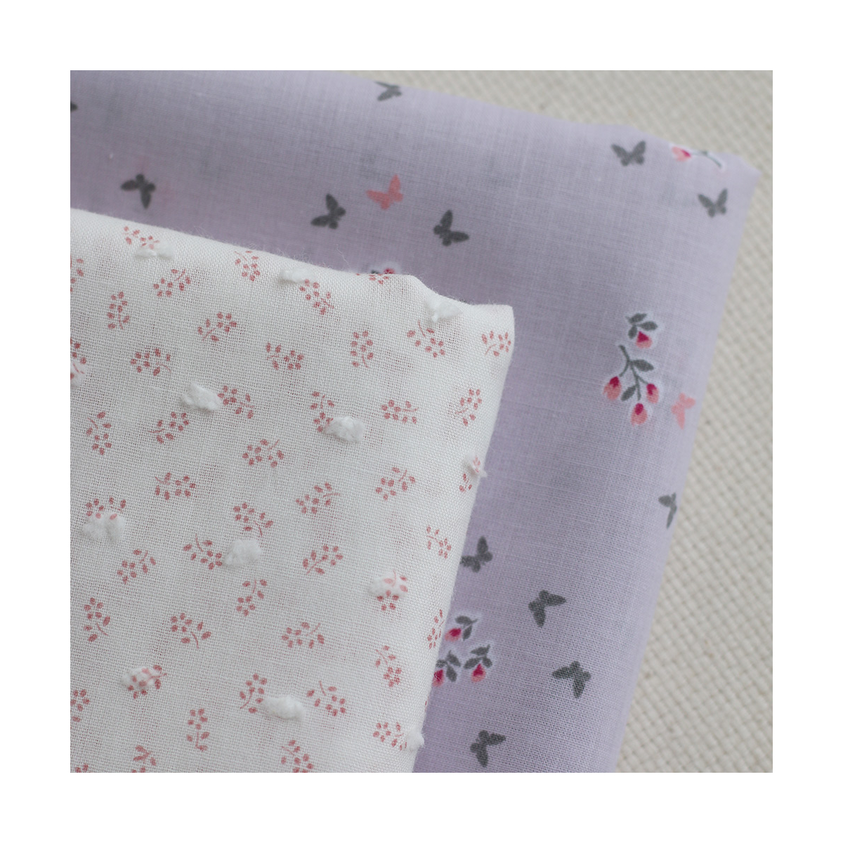 Anaelle - Plumetis de coton blanc imprimé fleuri vieux rose