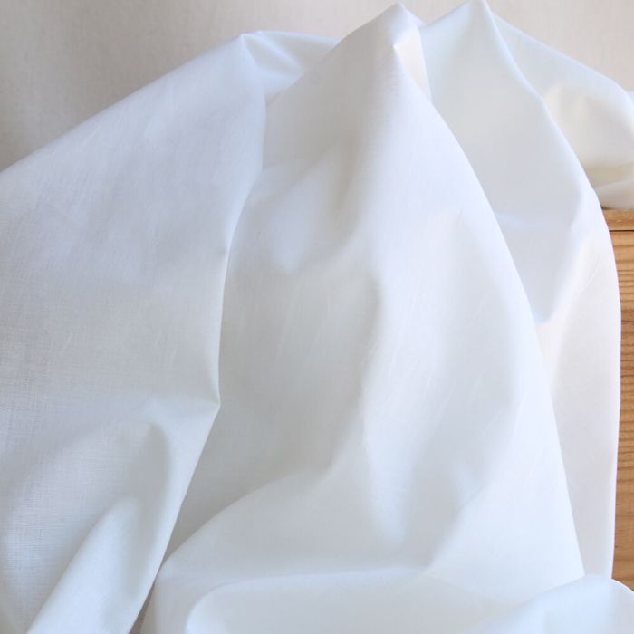 Voile de coton organique uni coloris blanc ivoire