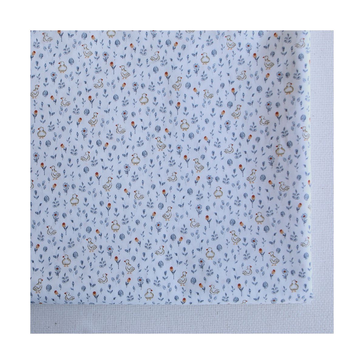Nestor - Popeline de coton douce qualité SWEET fond lait petits canards bleu