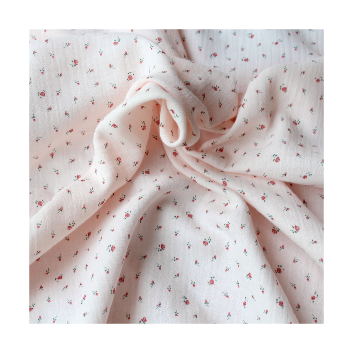 Double gaze de coton rose poudré à motifs petites fleurs