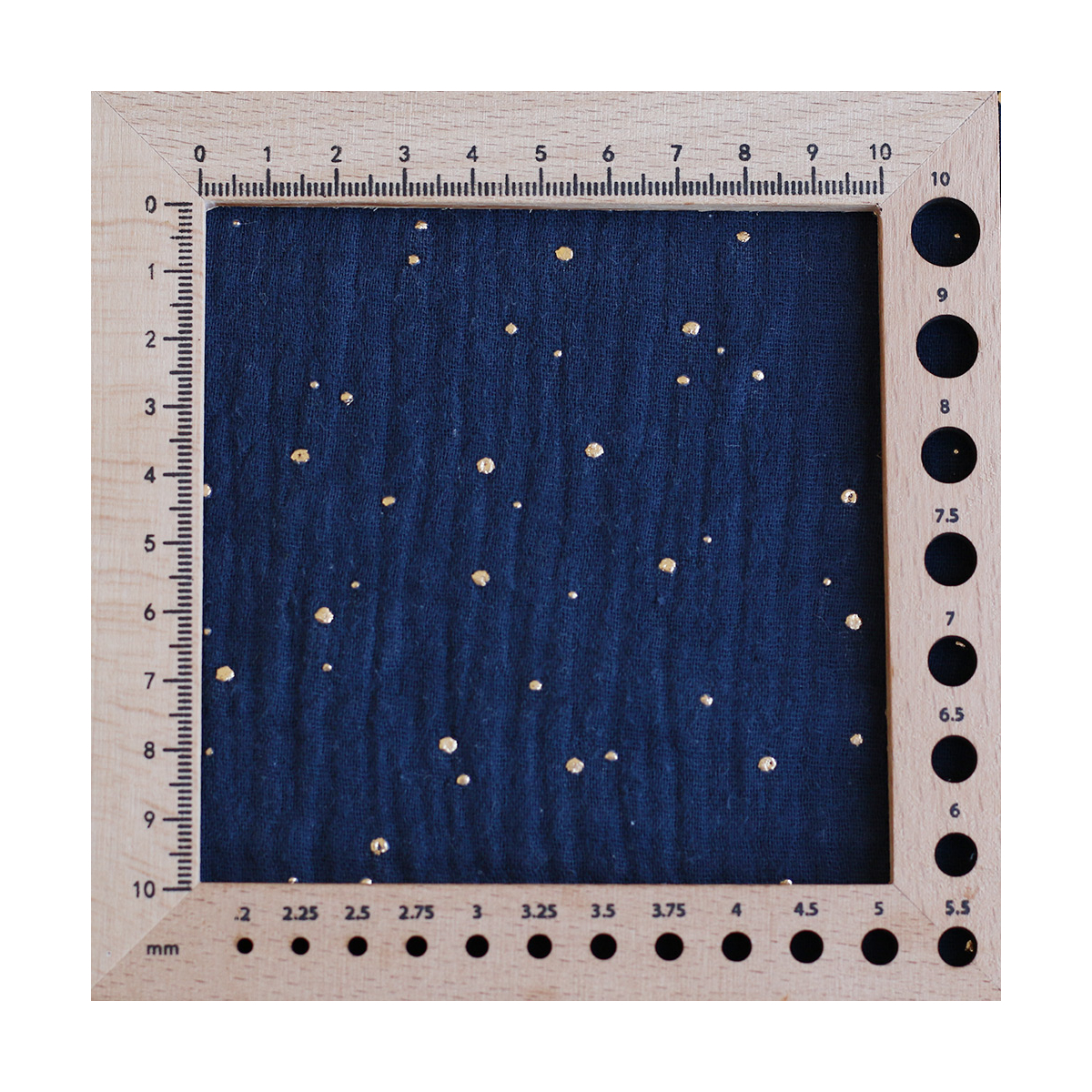 Double gaze de coton pois dorés fond bleu marine
