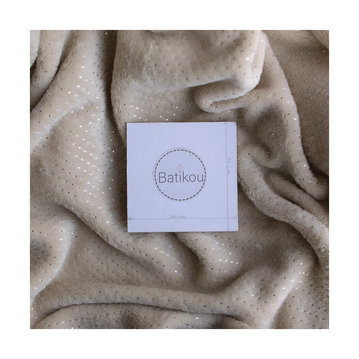 Polaire douce beige motif pois argentés