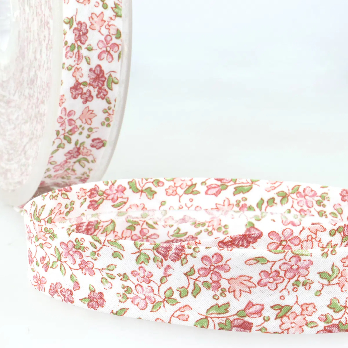 Biais replié fleuri 20 mm coloris rouge et rose, petit semis floral façon liberty sur fond blanc