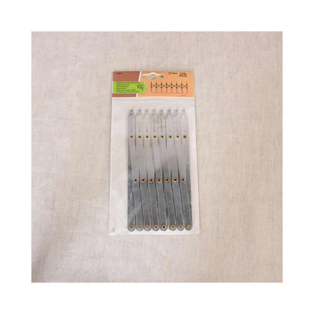 Règle à boutonnières Mediac en aluminium