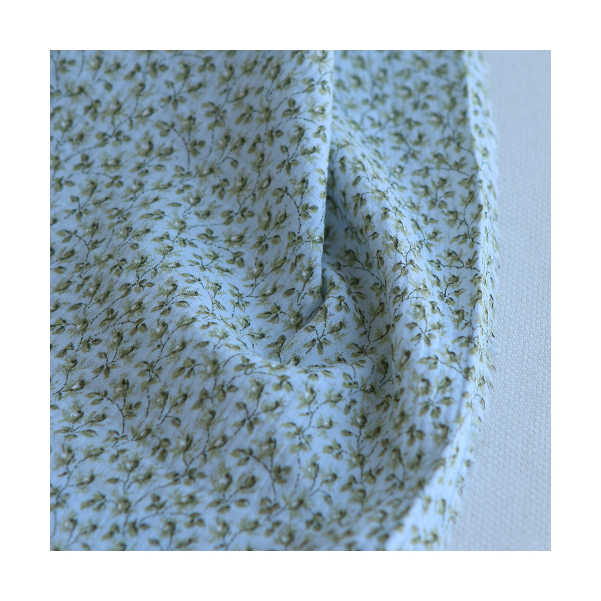 Harper - Double gaze de coton motif fleuri fond bleu ciel