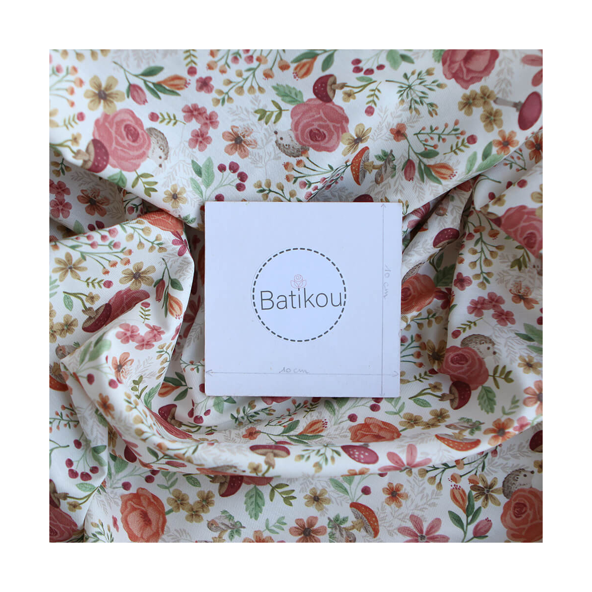 Tissu twill sergé coton organique imprimé fleuri hérissons bordeaux