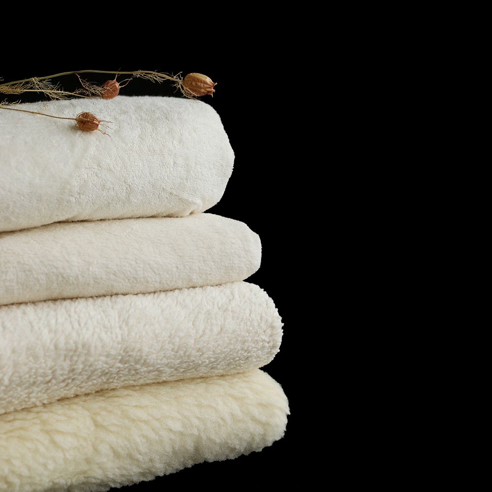 Shaun - Tissu fourrure pure laine vierge de mouton BIO tissée sur coton