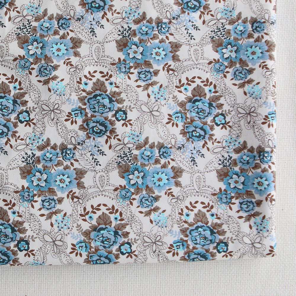 Amalia - Sergé de coton BIO organique imprimé fleuri marron et bleu