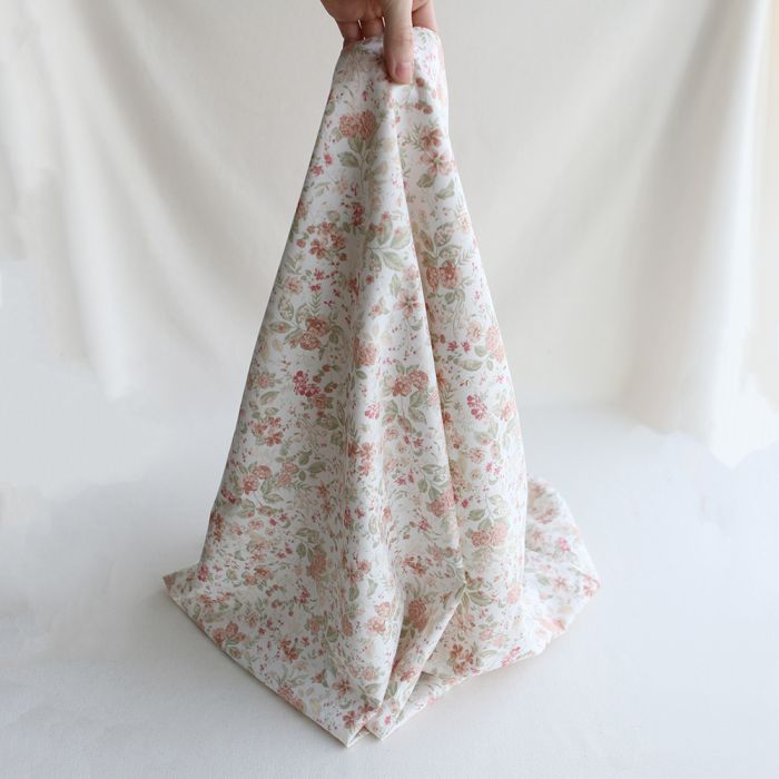 Magali - Tissu coton texturé imprimé fleuri nude
