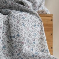 Lexie - Batiste de coton SILKYNE à imprimé fleuri teintes de gris et bleu