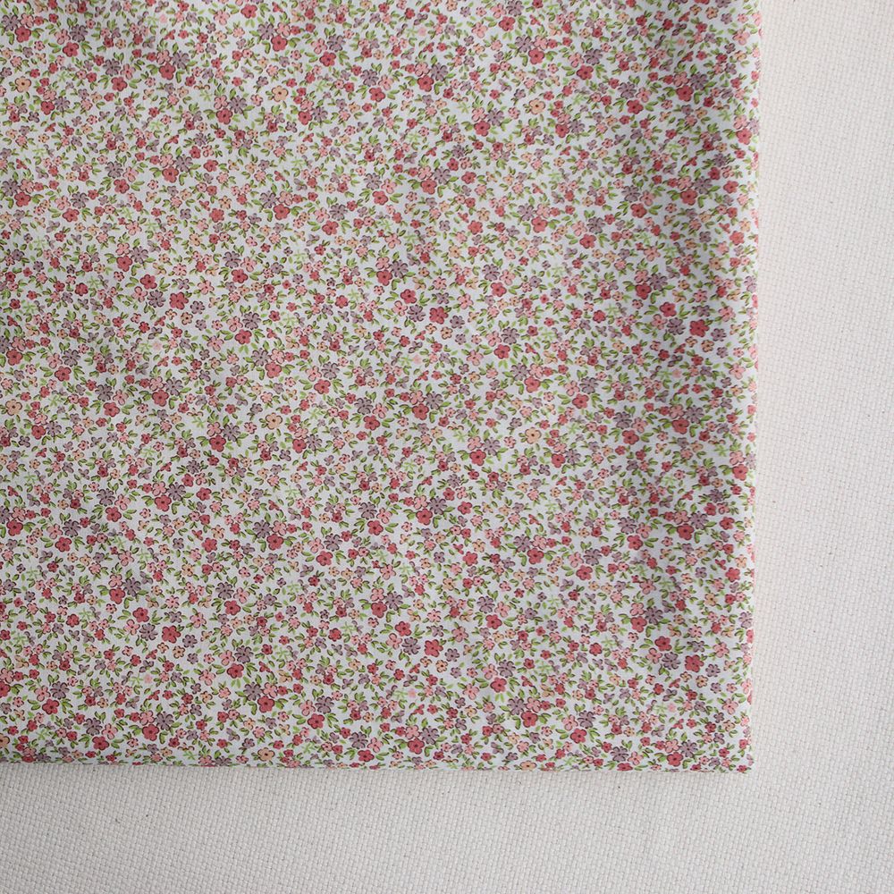 Lison - Batiste de coton SILKYNE à imprimé petit fleuri teintes roses