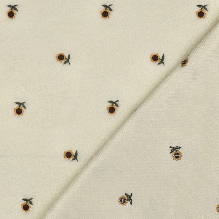 Tissu teddy brodé petits tournesols coloris écru