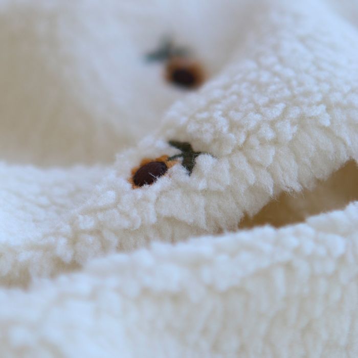 Tissu teddy brodé petits tournesols coloris écru