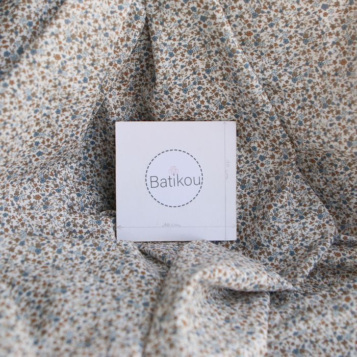 Lison - Batiste de coton SILKYNE à imprimé petit fleuri teintes bleu et marron