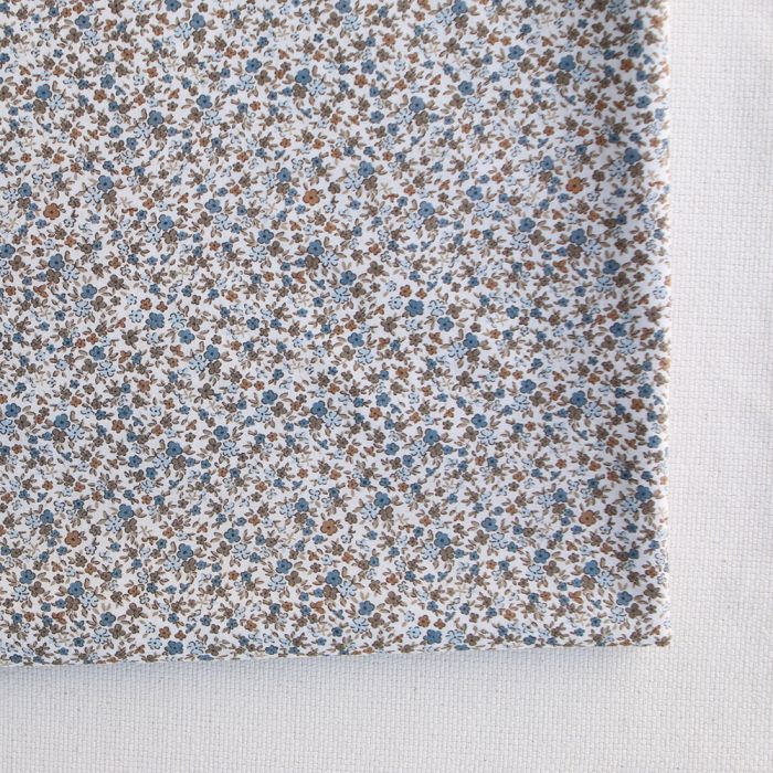 Lison - Batiste de coton SILKYNE à imprimé petit fleuri teintes bleu et marron