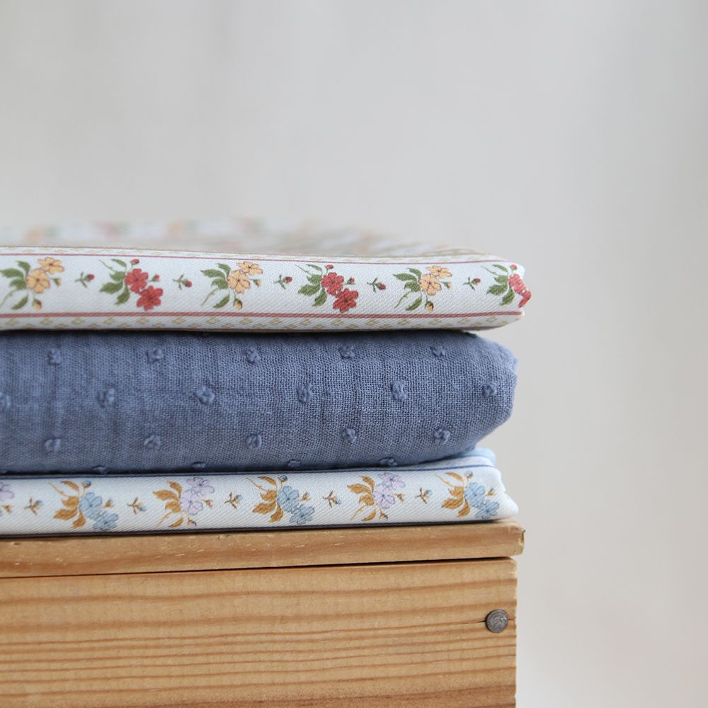 Double gaze de coton BIO plumetis Bleu jean