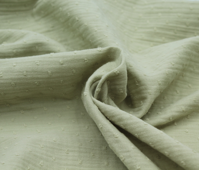 Double gaze de coton BIO plumetis vert amande