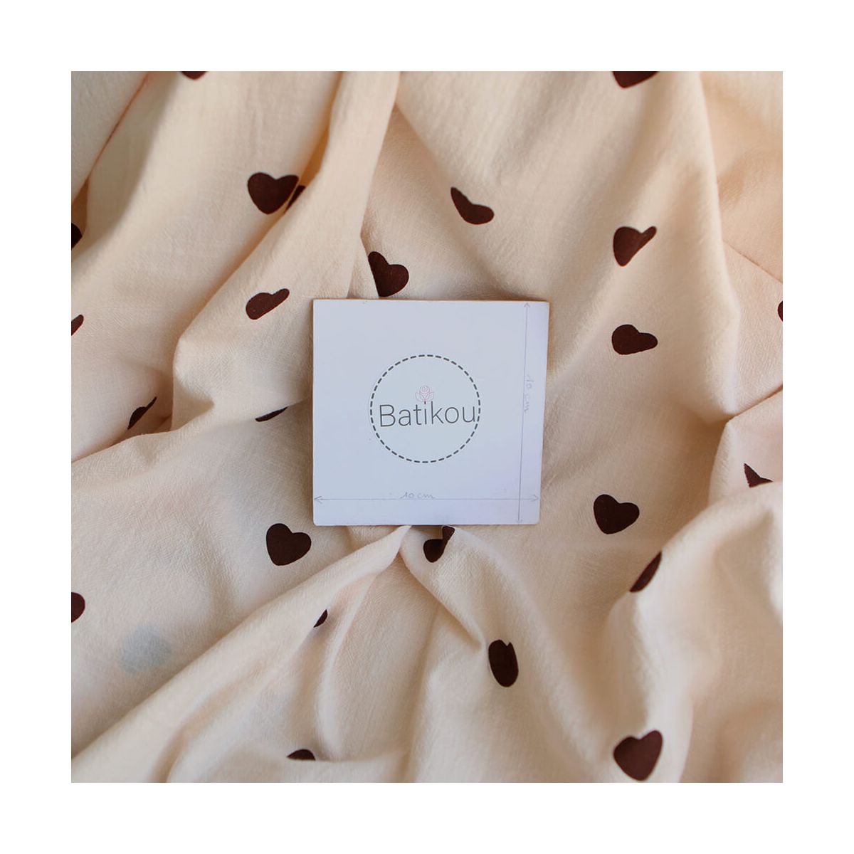 Manou - Coton lavé bio coloris vanille motif coeurs chocolat