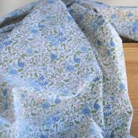 Amelie - Popeline de coton fleuri teintes bleues