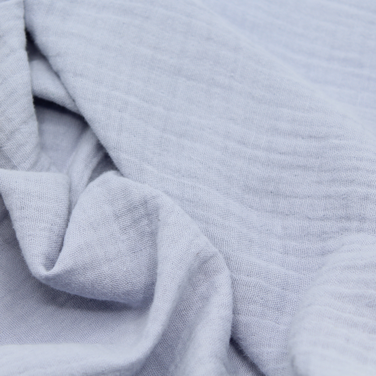 Double gaze de coton BIO unie bleu pastel poudré