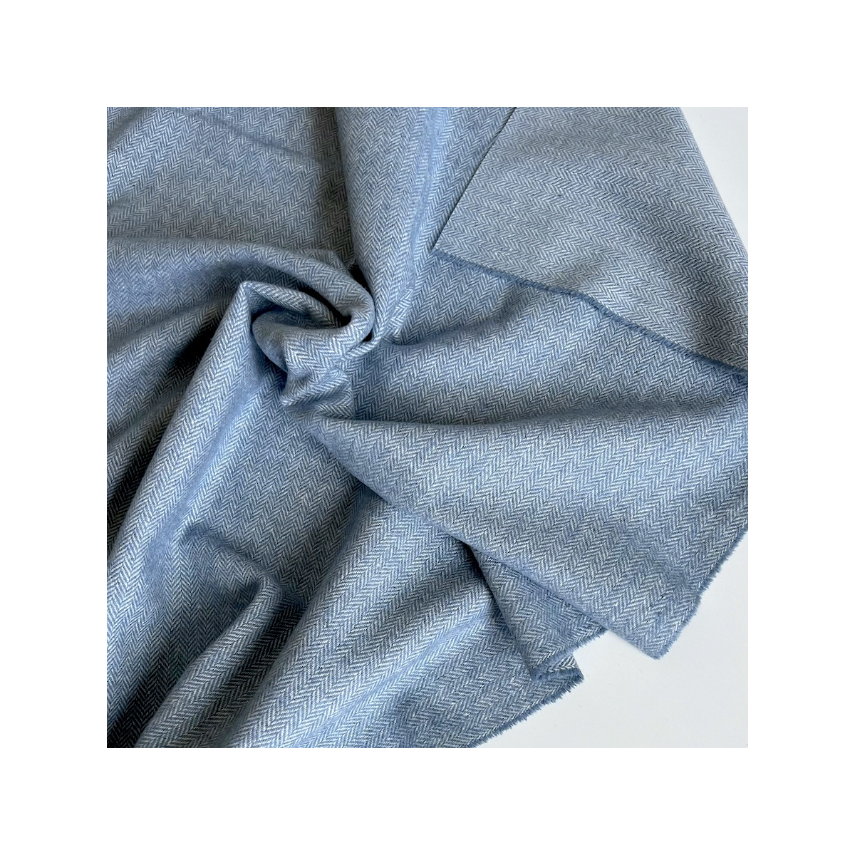 Tissu chevrons texturé coton / laine coloris bleu jean