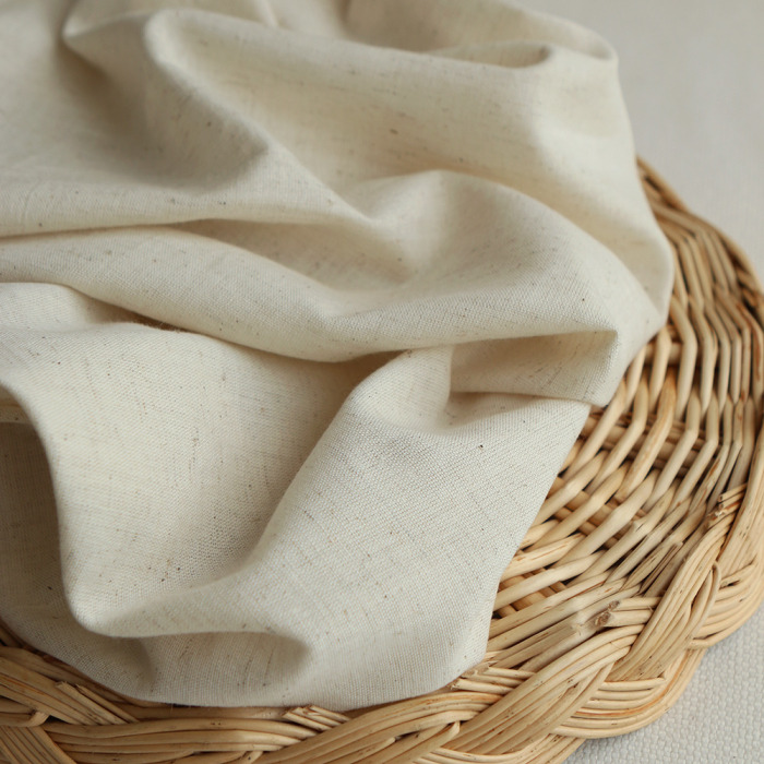 Tissu coton Riya uni effet lin naturel chiné écru