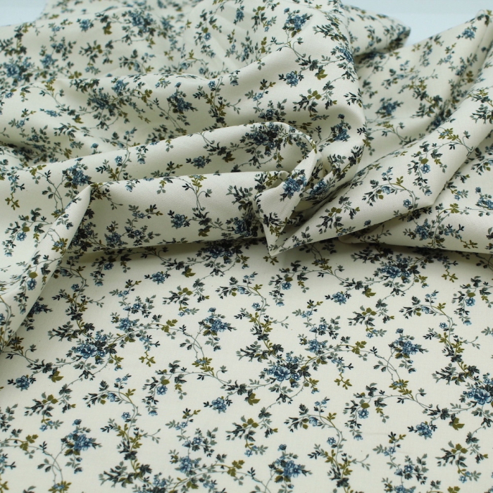 Popeline de coton fine et douce organique fond ivoire imprimé fleuri bleu vert