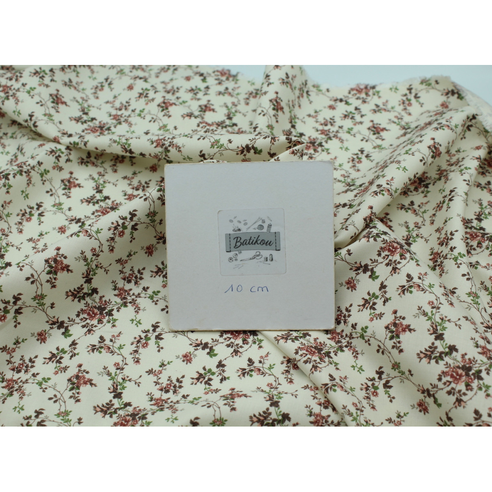 Popeline fine et douce coton organique fond ivoire imprimé fleuri vieux rose