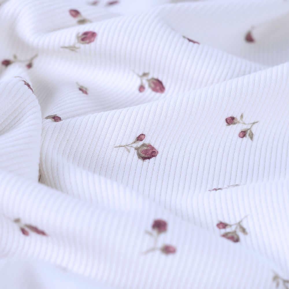 Jersey coton côtes fines à motif fleuri bois de rose fond blanc lait