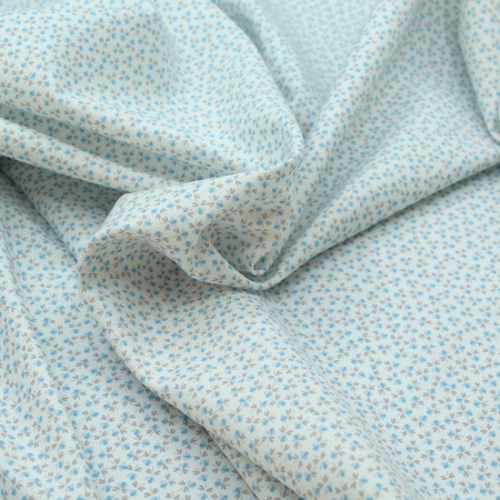 Tissu sergé de coton organique imprimé petit fleuri bleu