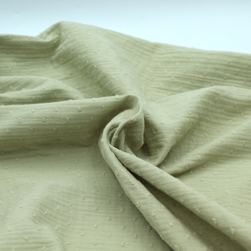 Double gaze de coton BIO plumetis vert amande Double gaze de coton BIO plumetis vert amande