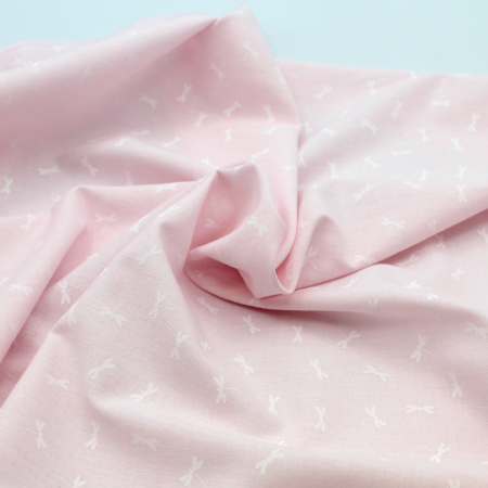 Chambray coton coloris rose layette à motif libellules blanches