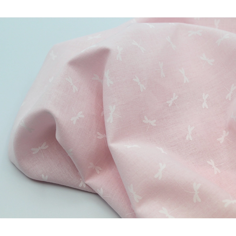 Chambray coton coloris rose layette à motif libellules blanches