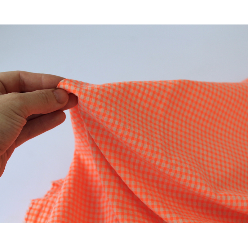 Seersucker / Coton gaufré vichy orange fluo