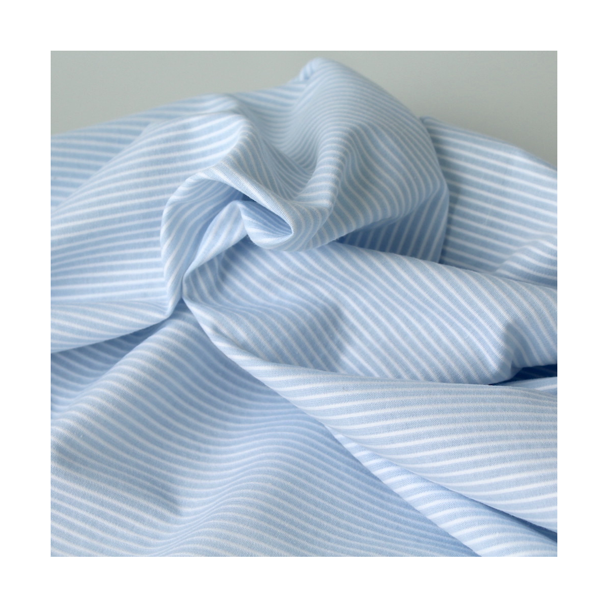 Coton bio gaufré à rayures bleu ciel / blanc