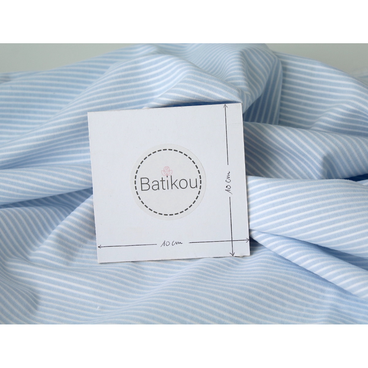 Coton bio gaufré à rayures bleu ciel / blanc