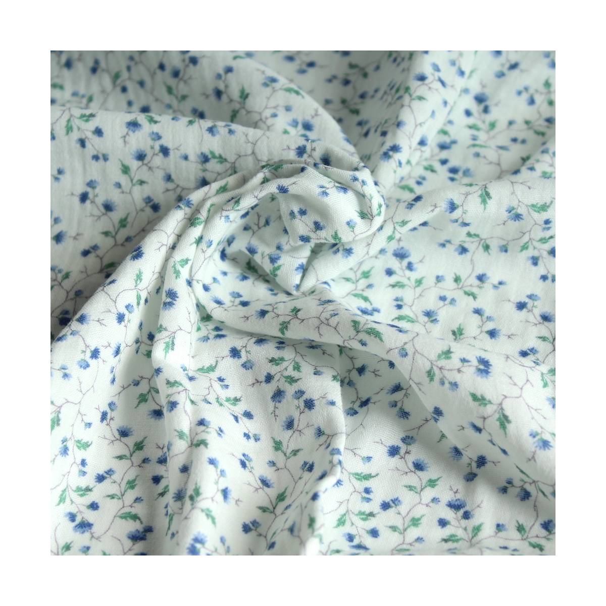 Double gaze de coton lisse à branchage et fleurs bleues