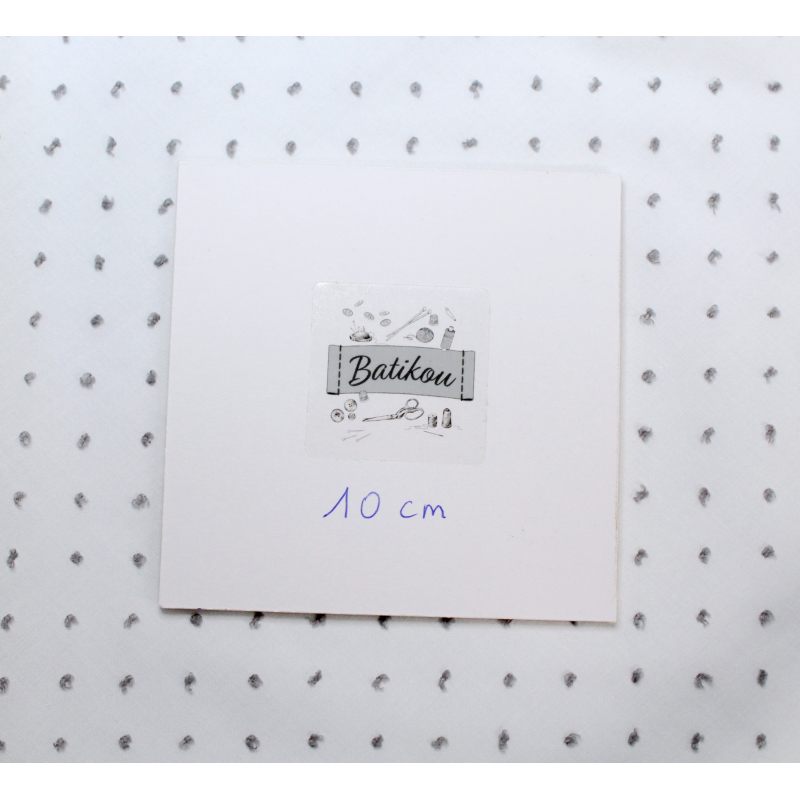 Plumetis de coton bicolore blanc gris