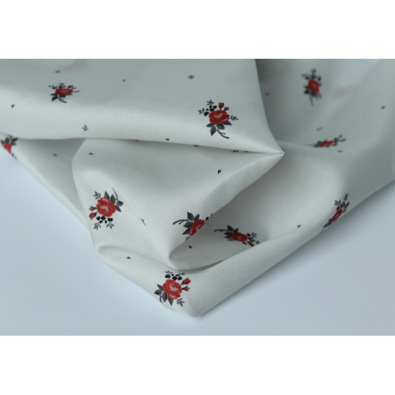 Coton satiné motif Lily exclusif Batikou fond blanc grisé