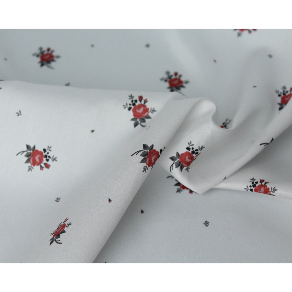 Coton satiné motif Lily exclusif Batikou fond blanc grisé