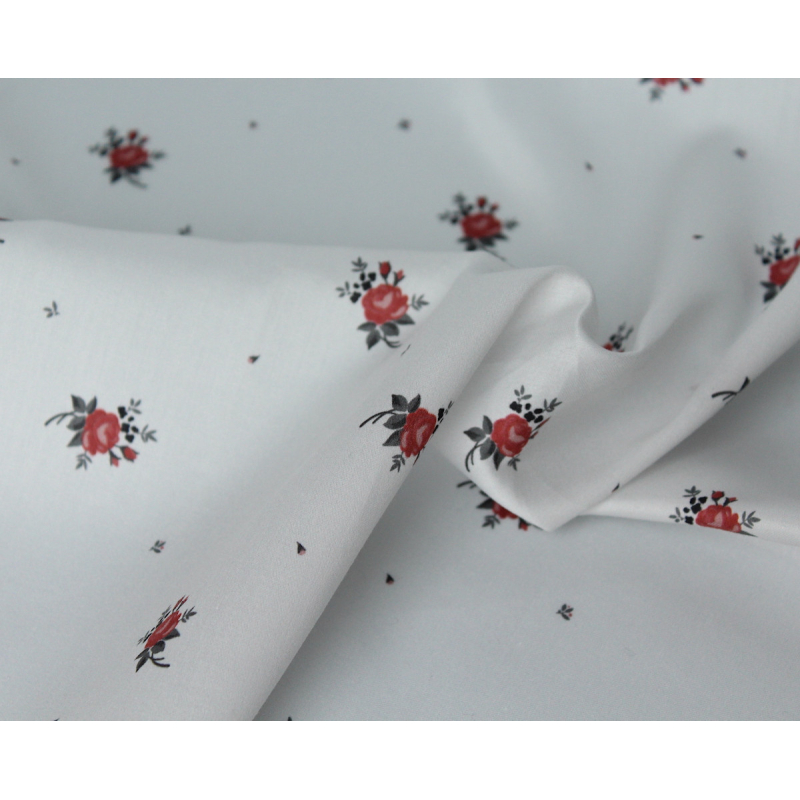 Coton satiné motif Lily exclusif Batikou fond blanc grisé