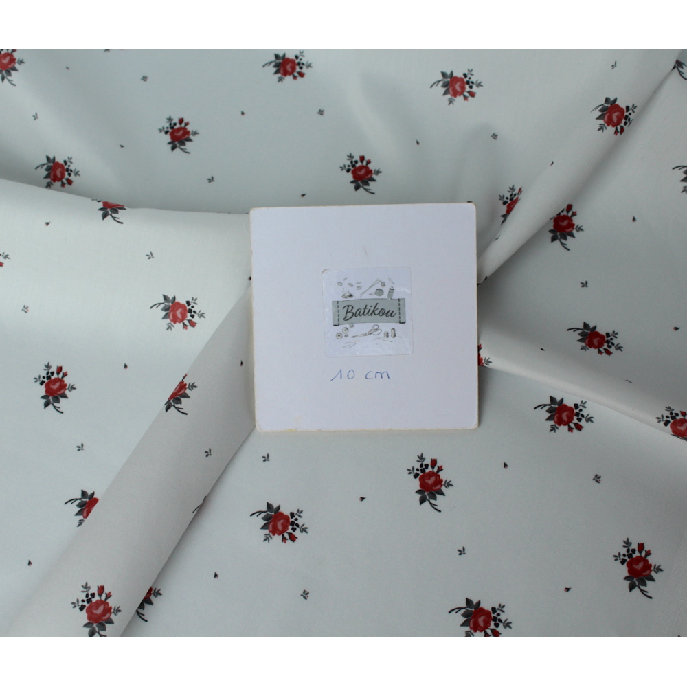 Coton satiné motif Lily exclusif Batikou fond blanc grisé